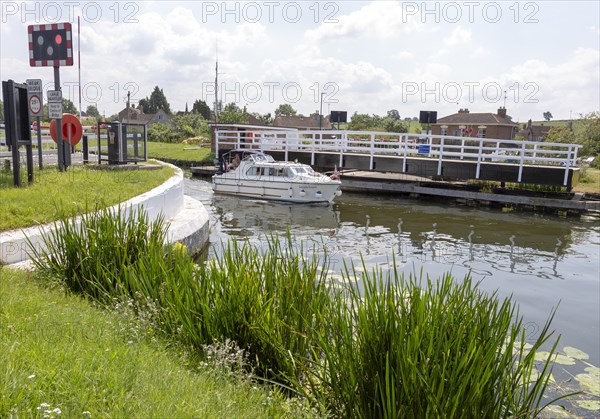 Gloucester and Sharpness Canal, Purton, Gloucestershire, England, UK boat passing through open swing bridge