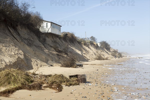 March 2018, Clifftop property collapsing due to coastal erosion after recent storm force winds, Hemsby, Norfolk, England, UK