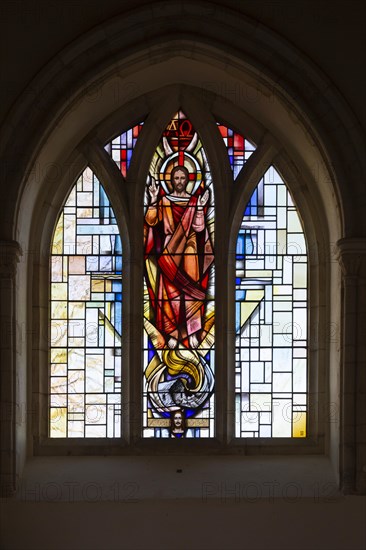 Risen Christ stained glass east window church of Saint Mary, Newbourne, Suffolk, England, UK