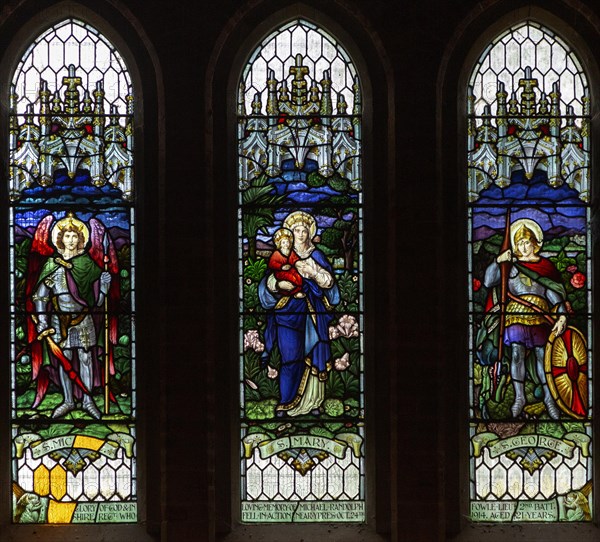 Stained glass window, Chute church, Wiltshire, England, UK Saints Michael, Mary and George