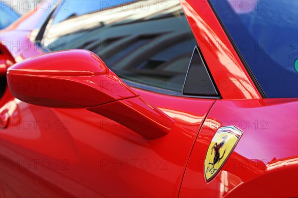 Ferrari logo on a red Ferrari