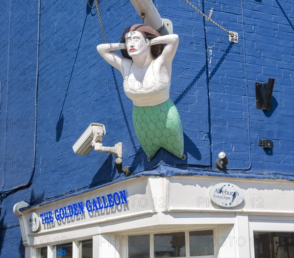 Mermaid ship's figurehead above the Golden galleon fish and chips shop, Aldeburgh, Suffolk, England, UK