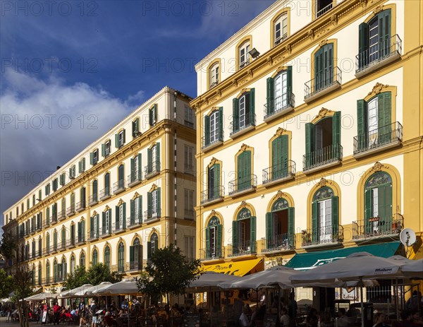Winter evening sunshine historic facade of buildings, Plaza de la Merced, Malaga, Andalusia, Spain, Europe