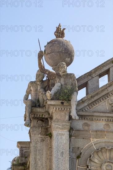 Church of Igreja de Nossa Senhora de Graca, Evora, Alto Alentejo, Portugal, southern Europe two stone Atlas-like figures sit on each corner nicknamed by locals the 'children of Grace', Europe