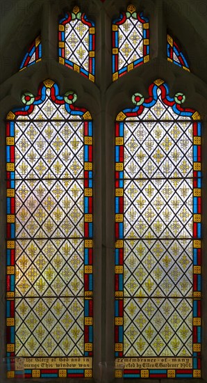 Victorian 19th century decorative patterned stained glass window, Alpheton church, Suffolk, England, UK