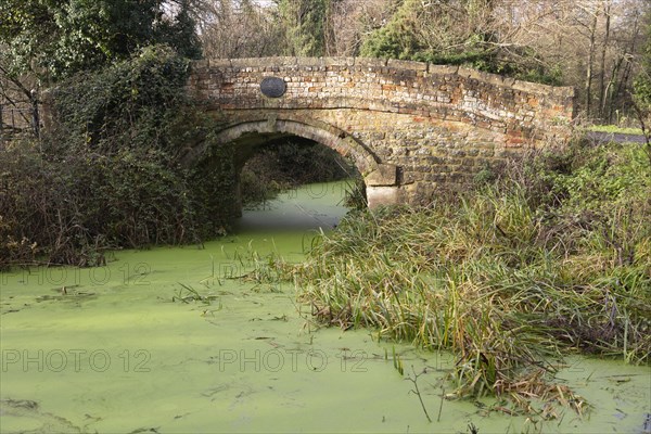 Historic packhorse bridge on branch of Wiltshire and Berkshire canal, Calne, England, UK