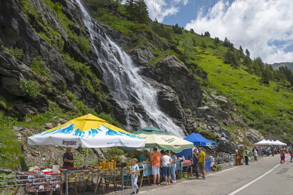 Lively atmosphere at a market stall near a large waterfall on a road, Capra Waterfall, Goat Waterfall, Transfogarasan High Road, Transfagarasan, TransfagaraÈ™an, FagaraÈ™ Mountains, Fagaras, Transylvania, Transylvania, Transylvania, Ardeal, Transilvania, Carpathians, Romania, Europe