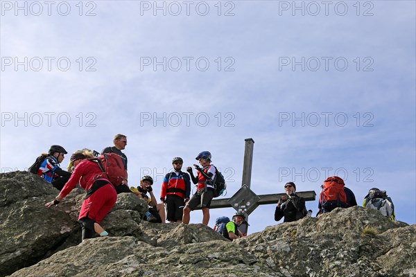 Mountain bike tour through the Bavarian Forest with the DAV Summit Club: stopover on the summit of the Osser, 1, 293 metres above sea level, excursion destination and border mountain between Germany and the Czech Republic