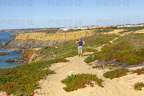 Woman walking Rota Vicentina, near Zambujeira do Mar, Alentejo Littoral, Portugal, Southern Europe, Europe