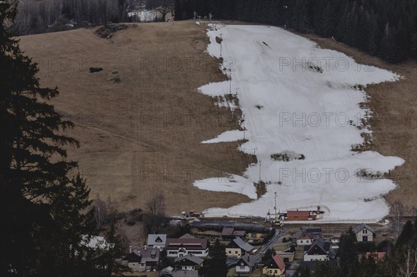 A partially melted piste can be seen on a slope, taken in the Jizera Mountains ski resort near Albrechtice v Jizerskych Horach, 05/02/2024. The Czech low mountain range with its ski resort is affected by increasingly warmer and shorter winters