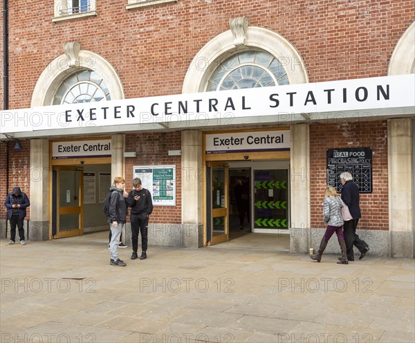 People outside Exeter Central Station railway station, Exeter city centre, Devon, England, UK