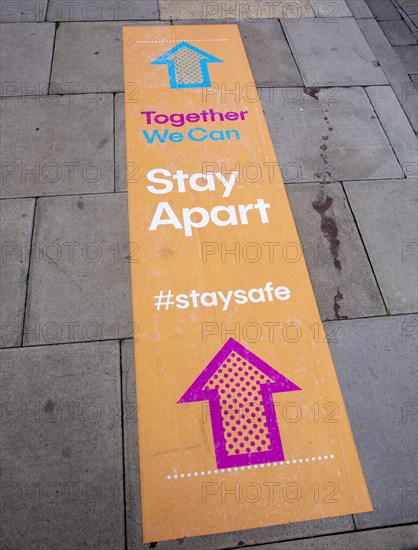 Together we can Stay Apart and stay safe, pavement banner sign Ipswich, Suffolk, England, UK July 2020 social distancing