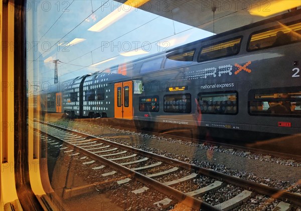 View from a train onto a double-decker regional train operated by National Express, Duesseldorf, North Rhine-Westphalia, Germany, Europe
