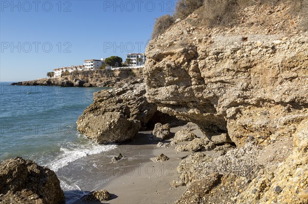 Coastal cliff composed of conglomerate sedimentary rocks at Nerja, Andalusia, Spain, Europe