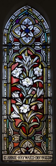 Stained glass window ornamental floral pattern lilies circa 1880 Ward and Hughes, Wilsford church, Wiltshire, England, UK