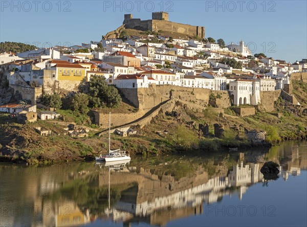 Historic hilltop walled medieval village of Mertola with castle, on the banks of the river Rio Guadiana, Baixo Alentejo, Portugal, Southern Europe, Europe