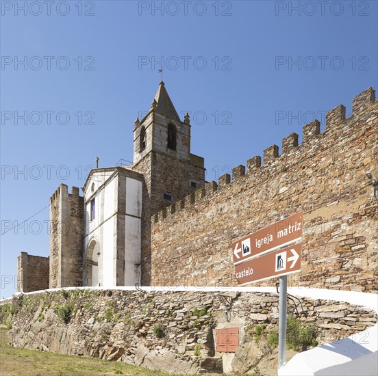 Matriz church in walls of historic ruined castle at Mourao, Alentejo Central, Evora district, Portugal, southern Europe, Europe