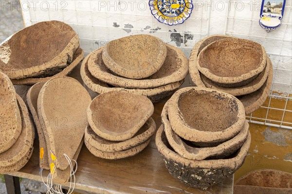 Close up of shop display of bowls made from cork oak tourist souvenir products on sale, city of Evora, Alto Alentejo, Portugal, southern Europe, Europe