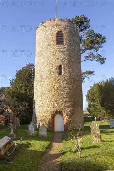 Unusual detached round tower in churchyard of church of Saint Andrew, Bramfield, Suffolk, England, UK