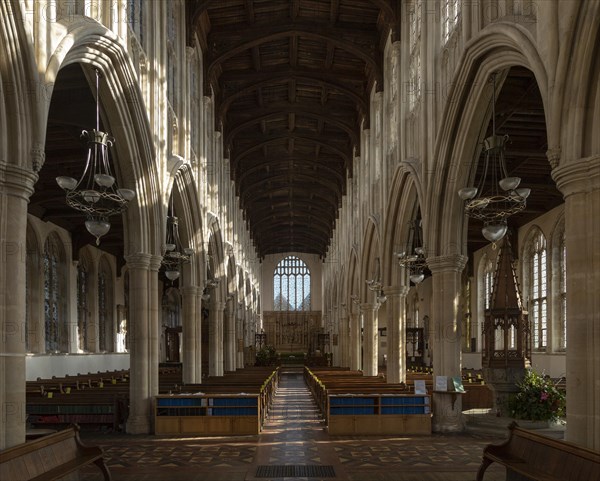 Interior of Holy Trinity Church, Long Melford, Suffolk, England, UK view down nave to east window