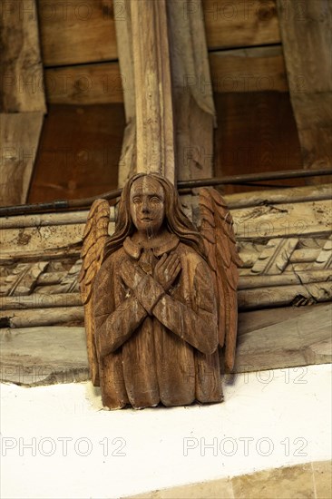 Church of All Saints, Great Glemham, Suffolk, England, UK carved wooden angel roof beam