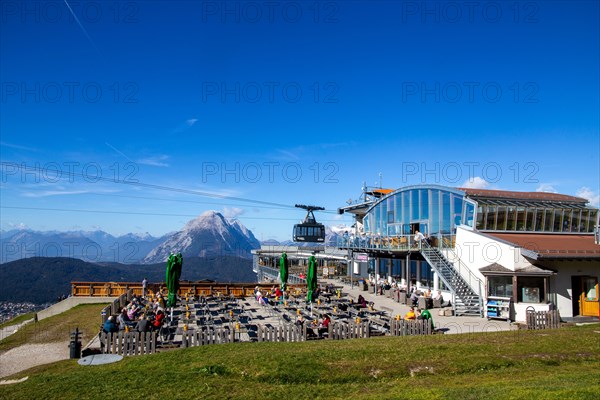 Rosshuette mountain station in Seefeld/Tyrol. Many tourists and locals take advantage of the sunny autumn day for an excursion (19 October 2022)