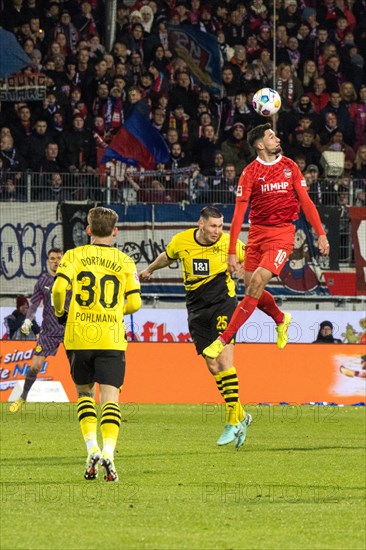 Football match, Niklas SUeLE Borussia Dortmund loses the header duel with Tim KLEINDIENST 1.FC Heidenheim, football stadium Voith-Arena, Heidenheim