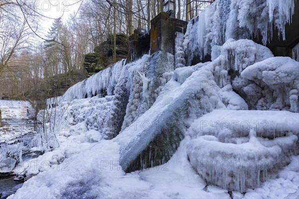 The Niezelgrund hydroelectric power plant power station is a listed small hydroelectric power station in Saxony and is located between Porschendorf and Lohmen on the Wesenitz. In severe frost, the site is transformed into a bizarre ice landscape, Lohmen, Saxony, Germany, Europe