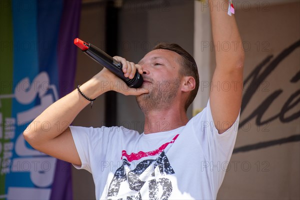 Rapper and peace activist Kilez More sings against war and armament and in favour of diplomacy and negotiations at the peace demonstration in front of Ramstein Air Base