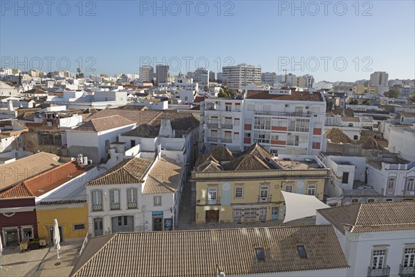 High density roof top view of buildings crowded together in the city centre of Faro, Algarve, Portugal, Europe