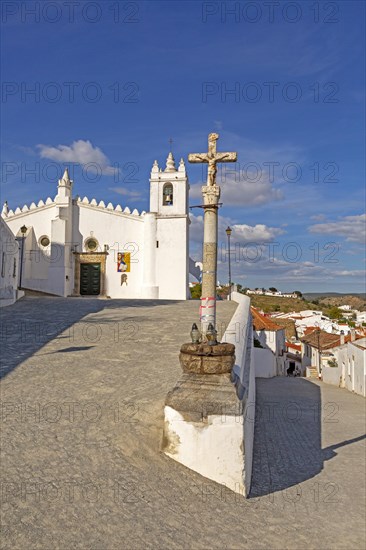 Historic whitewashed church Igreja Matrix in medieval village of Mertola, Baixo Alentejo, Portugal, Southern Europe, Europe