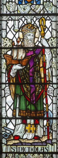 Stained glass window of Saint Nicholas, Saint Thomas church, Salisbury, Wiltshire, England, 1920, by James Powell and Sons