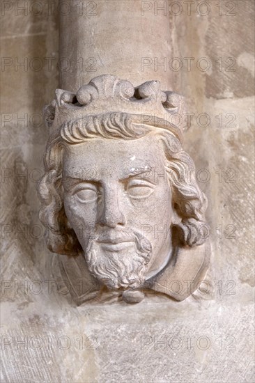 Victorian stone corbel carved head of a king, church of the Holy Cross, Sherston, Wiltshire, England, UK
