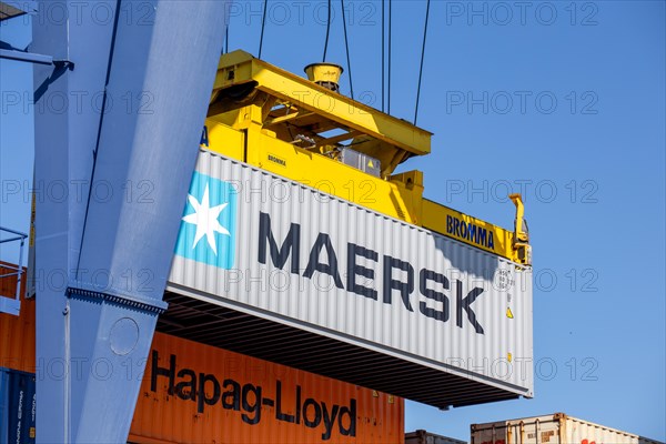 A Maersk Line container is loaded in the port of Mannheim, Germany. Supply bottlenecks and a sharp rise in container prices are currently affecting global trade