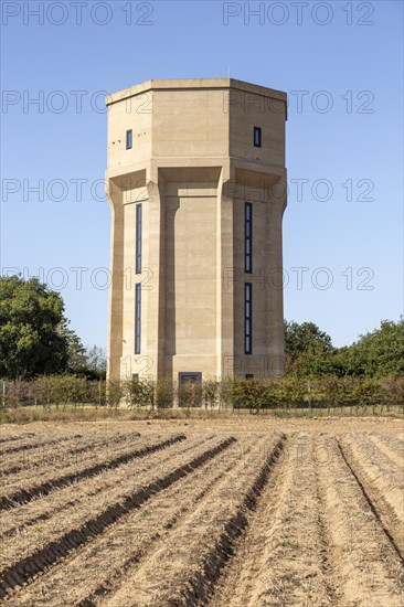 Concrete water tower converted to provide holiday home accommodation, Freston, Suffolk, England, UK