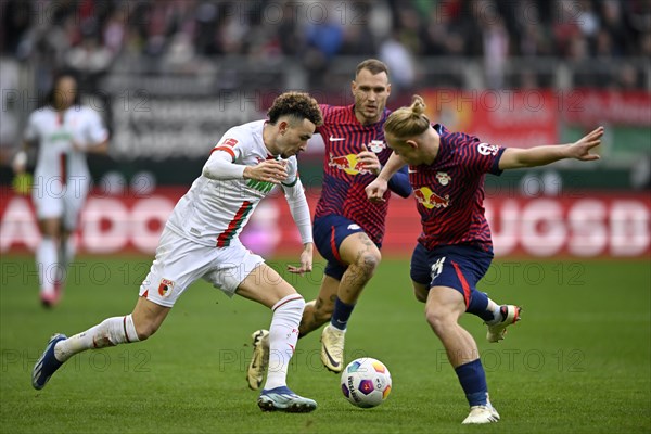 Ruben Vargas FC Augsburg FCA (16) v David Raum RasenBallsport Leipzig RBL (22) Xaver Schlager RasenBallsport Leipzig RBL (24) WWK Arena, Augsburg, Bavaria, Germany, Europe