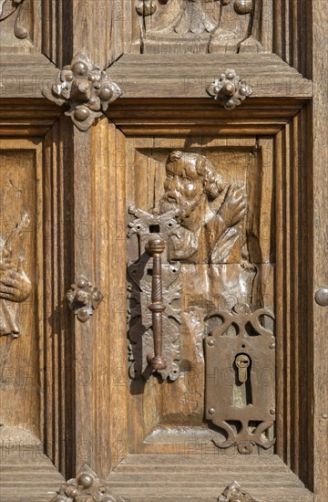 Historic carvings on wooden church door, Santa Maria la Mayor, Ezcaray, La Rioja, Spain, Europe