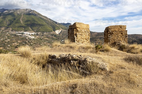 Ruins Castle of Zalia, La Axarquia, province of Malaga, Andalusia, Spain village Alcaucin village in background