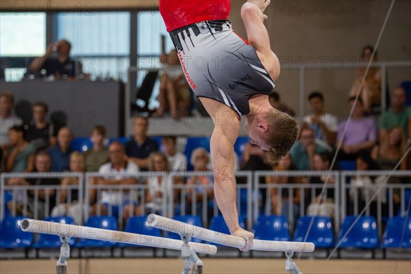 Heidelberg, 9 September 2023: Men's World Cup qualification in conjunction with a national competition against Israel. Glenn Trebing during his routine on parallel bars