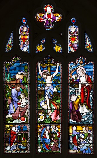 Stained glass window Lavers, Barraud and Westlake 1865 Good samaritan, Crucifixion, Jesus Christ saving Peter, Easton Royal, Wiltshire, England, UK