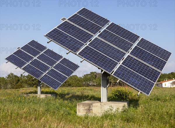 Solar panel array in rural location of field in countryside providing domestic energy near village of Rogil, Algarve district, Portugal, southern Europe, Europe