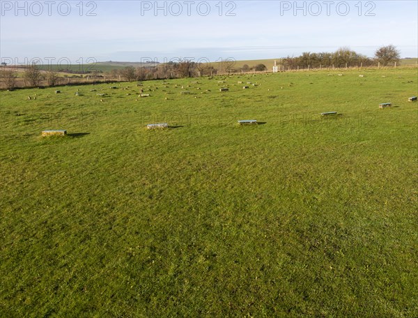 Concrete post markers at neolithic The Sanctuary prehistoric site, Overton Hill, Wiltshire, England, UK