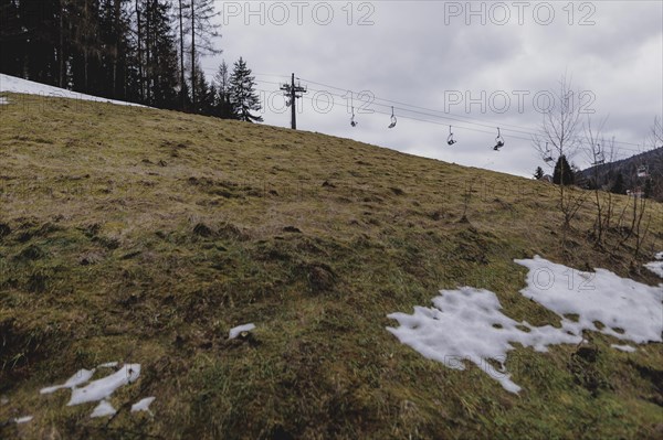 A chairlift, photographed on a ski slope in the Jizera Mountains ski resort near Albrechtice v Jizerskych Horach, 05/02/2024. The Czech low mountain range with its ski resort is affected by increasingly warmer and shorter winters