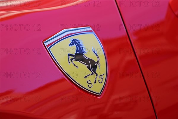 Ferrari logo on a red Ferrari