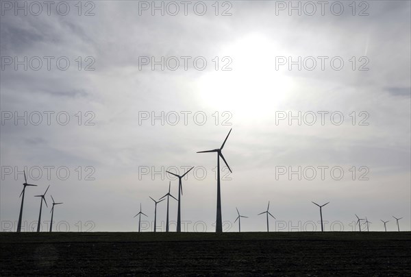 Windmills in a wind farm, Nauen, 03/03/2021