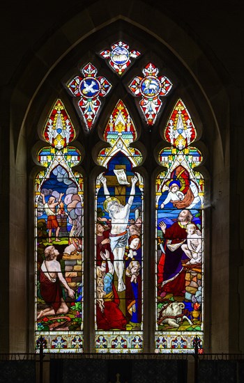 Stained glass window Washbrook church, Suffolk, England, UK by Ward and Hughes c 1870 Crucifixion and Sacrifice of Isaac