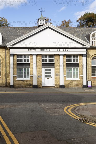 Historic building dated 1828 Boys' British School, Saffron Walden, Essex, England, UK