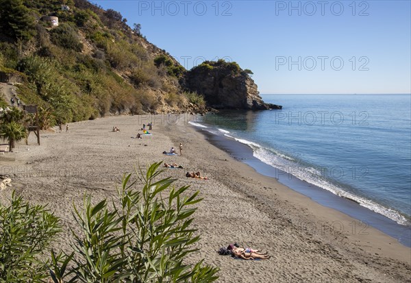 Sandy beach of Playa de Maro, near Nerja, Andalusia, Spain with calm Mediterranean Sea, out of season