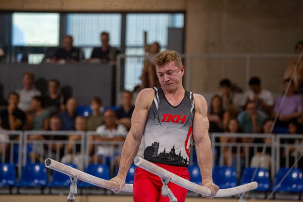 Heidelberg, 9 September 2023: Men's World Cup qualification in conjunction with a national competition against Israel. Glenn Trebing during his routine on parallel bars