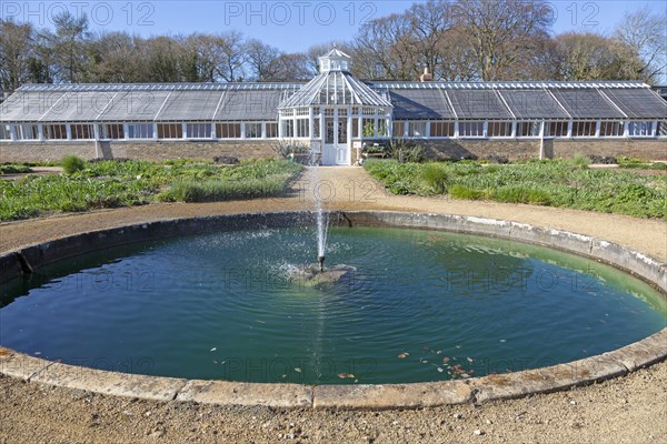 Garden designed by Piet Oudolf at Scampston Hall, Yorkshire, England, UK, Perennial Meadow pond and Pavilion